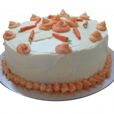 Carrot Cake with Cream Cheese Icing, swirls and fondant carrots 